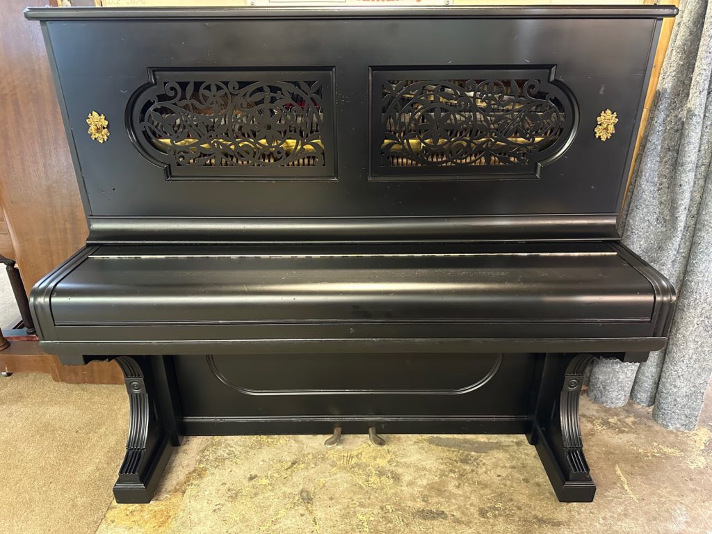 Black Antique Steinway Upright Piano