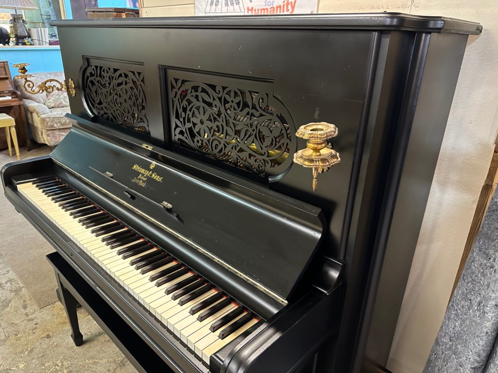 Black Antique Steinway Upright Piano