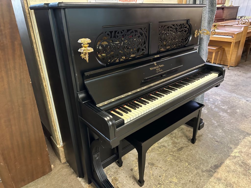 Black Antique Steinway Upright Piano