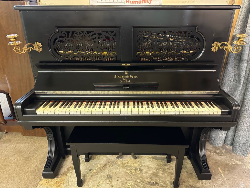 Black Antique Steinway Upright Piano