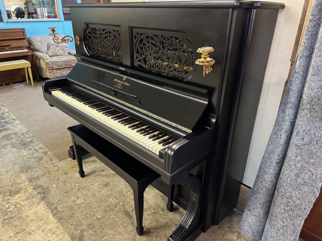 Black Antique Steinway Upright Piano